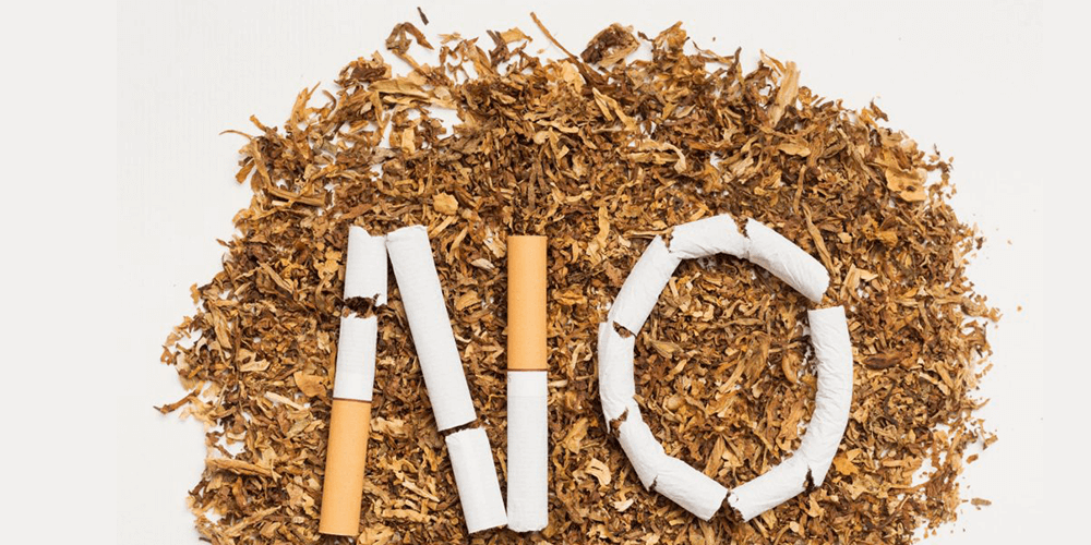 Cigarrillos rotos formando un no