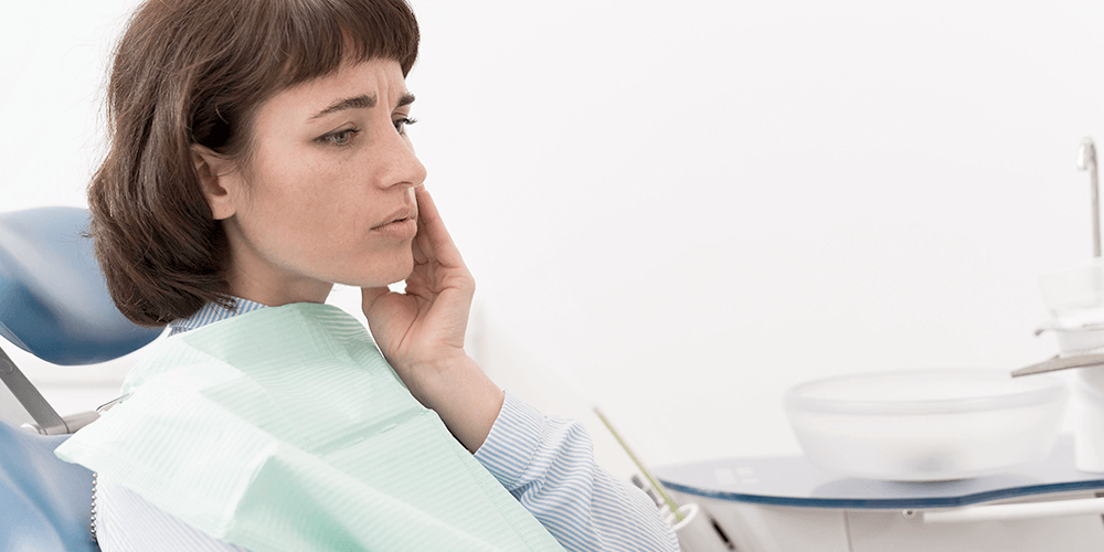 mujer en el dentista por dolor en la muela del juicio-problemas-portada-blog-clinica-soria